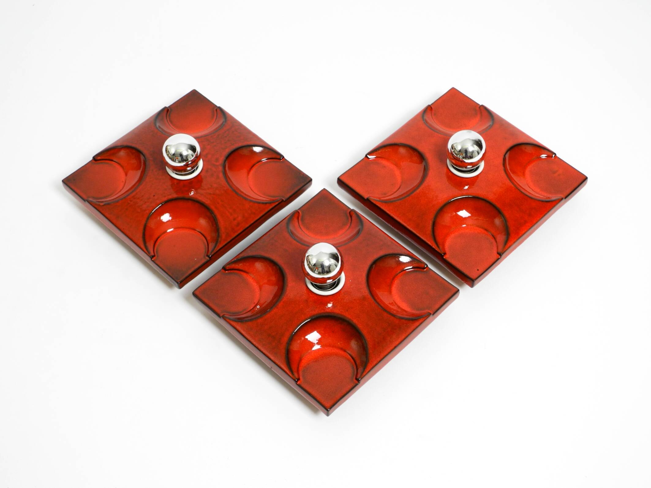 Three beautiful original 1970s Space Age red ceramic wall lamps