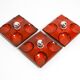 Three beautiful original 1970s Space Age red ceramic wall lamps