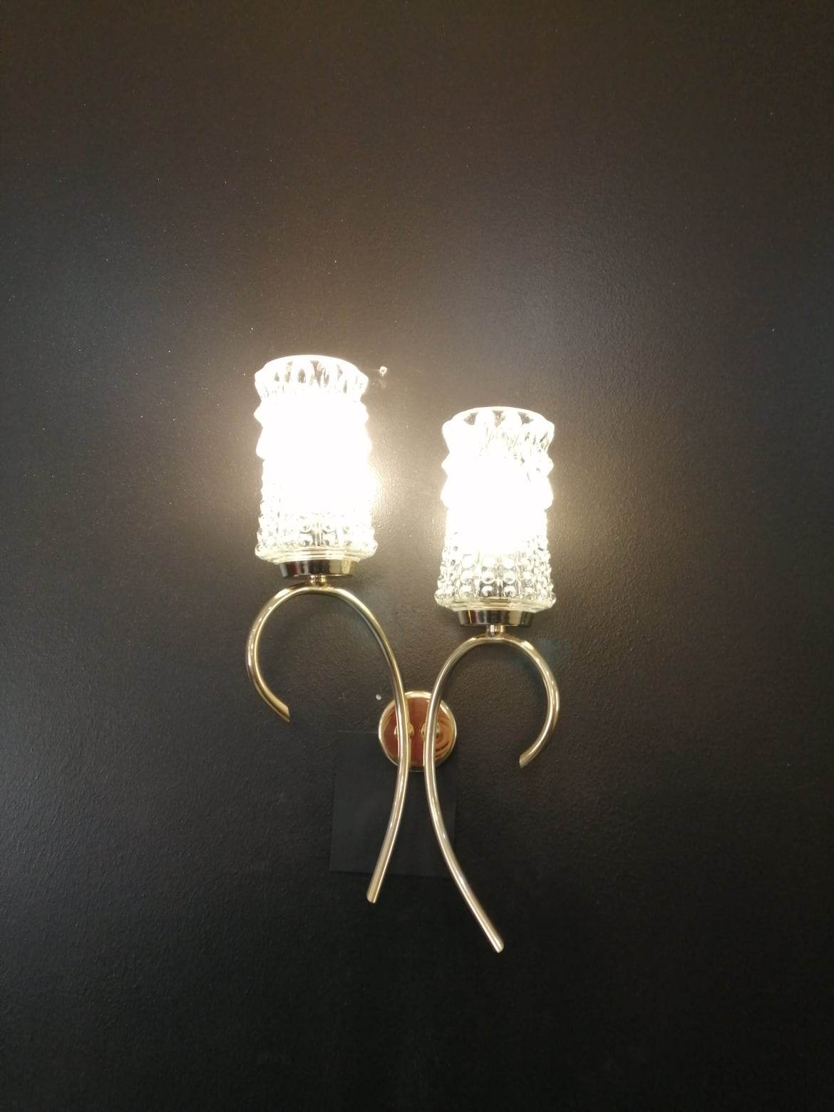Pair of 50s wall lamps in gold gilded metal