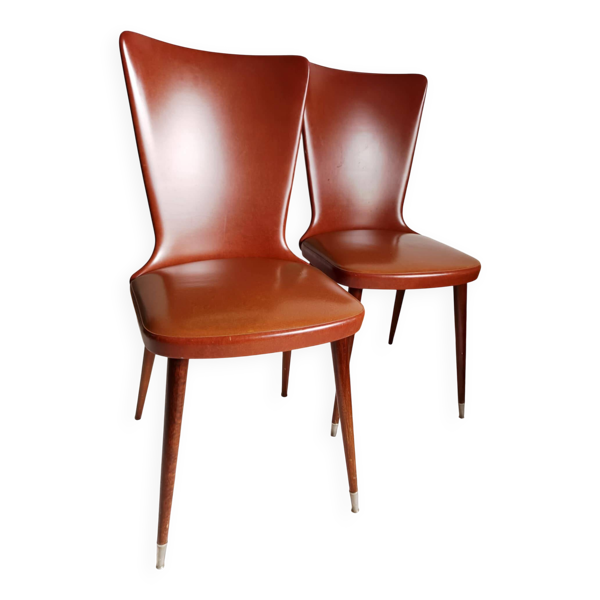 Paire de chaises Skaï vintage pieds compas