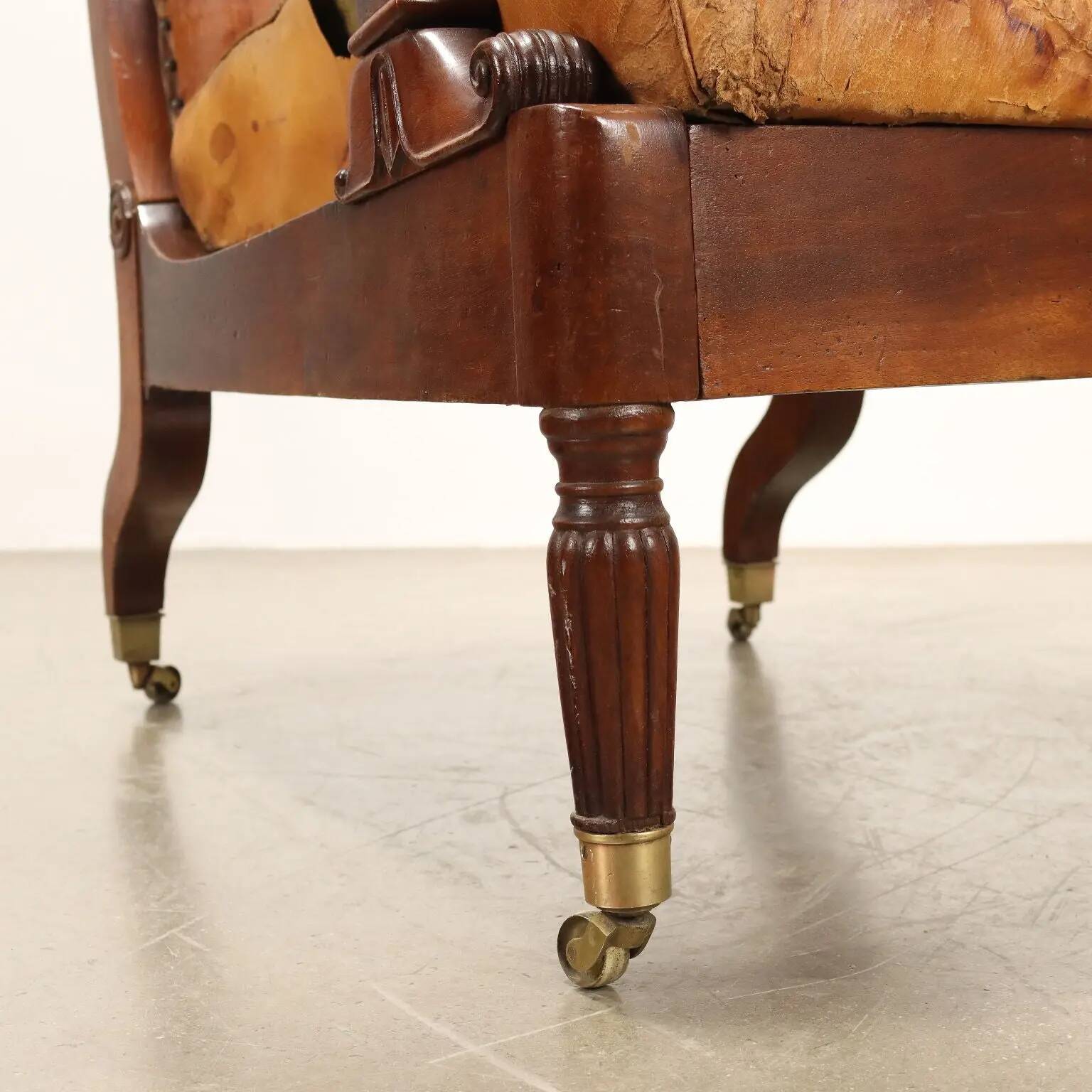Antique Louis-Philippe reclining armchair in walnut, Italy, 19th century.