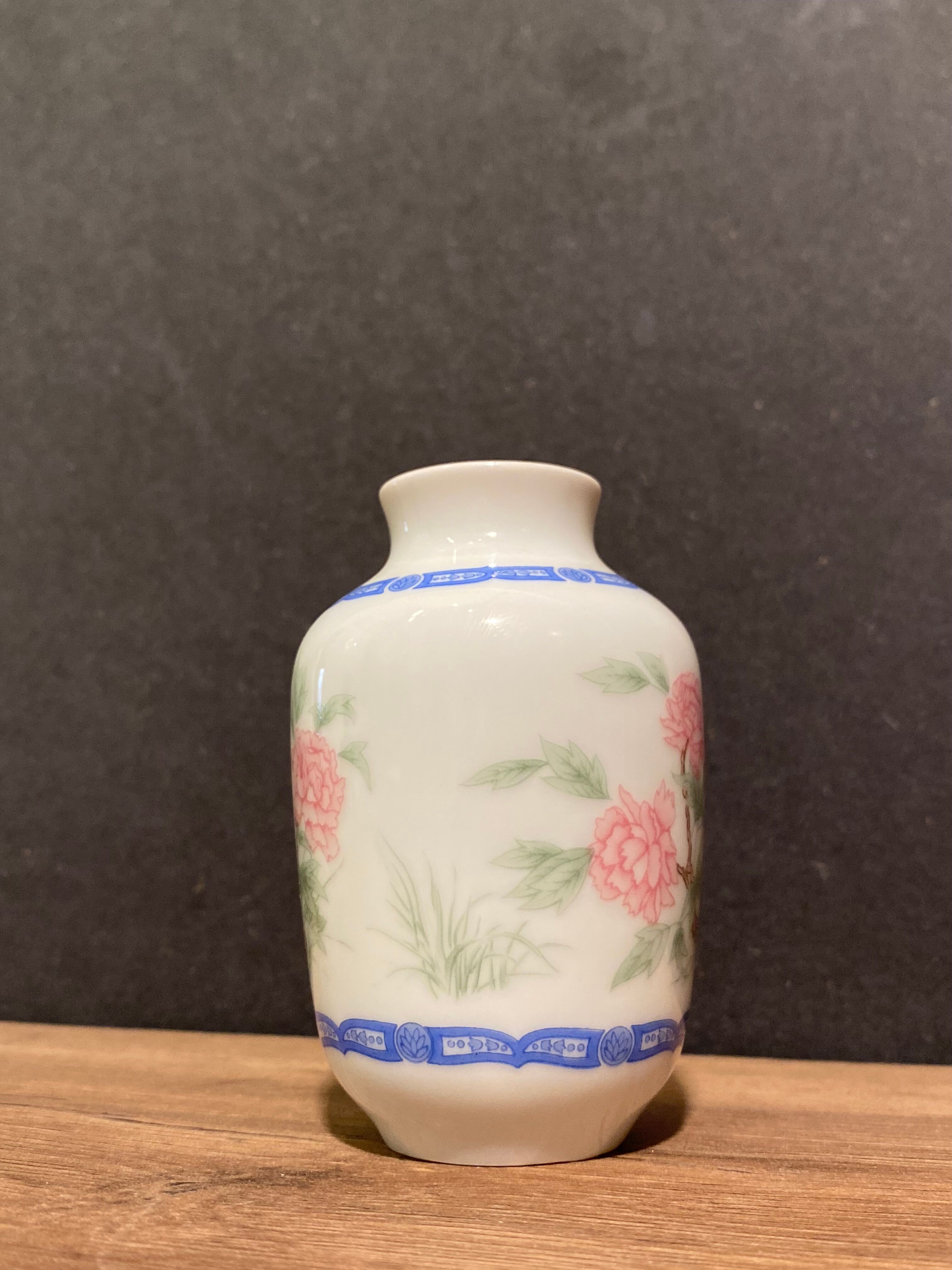 Miniature porcelain vase with floral decoration, Rose family