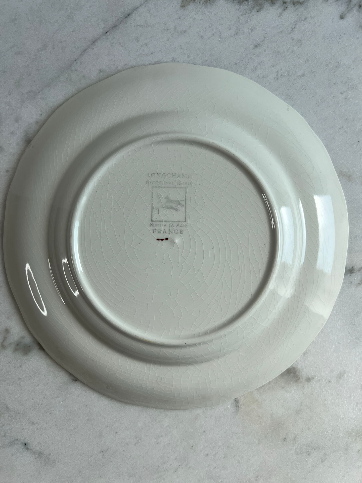 Longchamp hand-painted. Set of 2 flat plates.