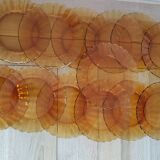 Fifteen amber Duralex model Marguerite plates