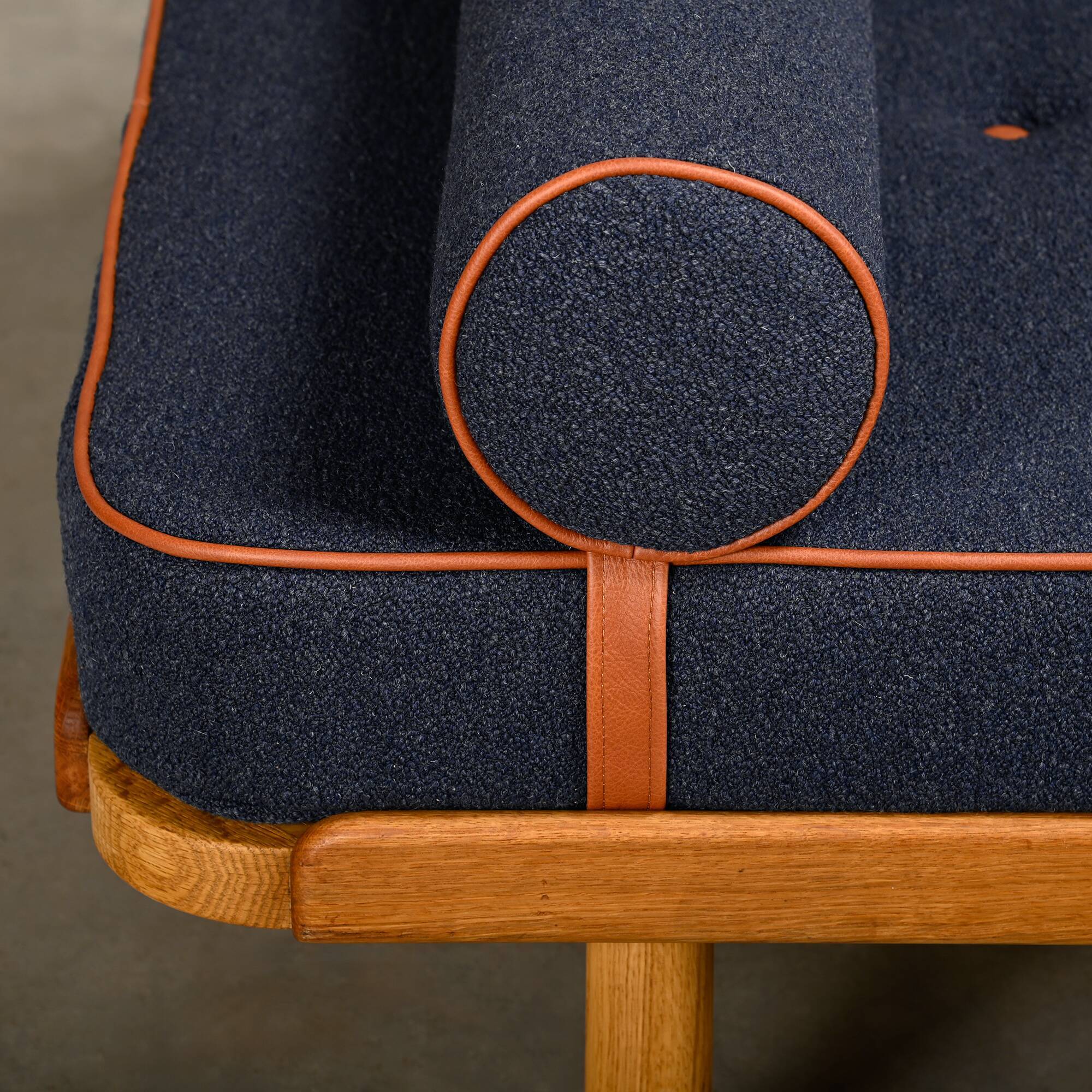 Scandinavian Daybed in Oak and dark Blue bouclé fabric with Leather accents