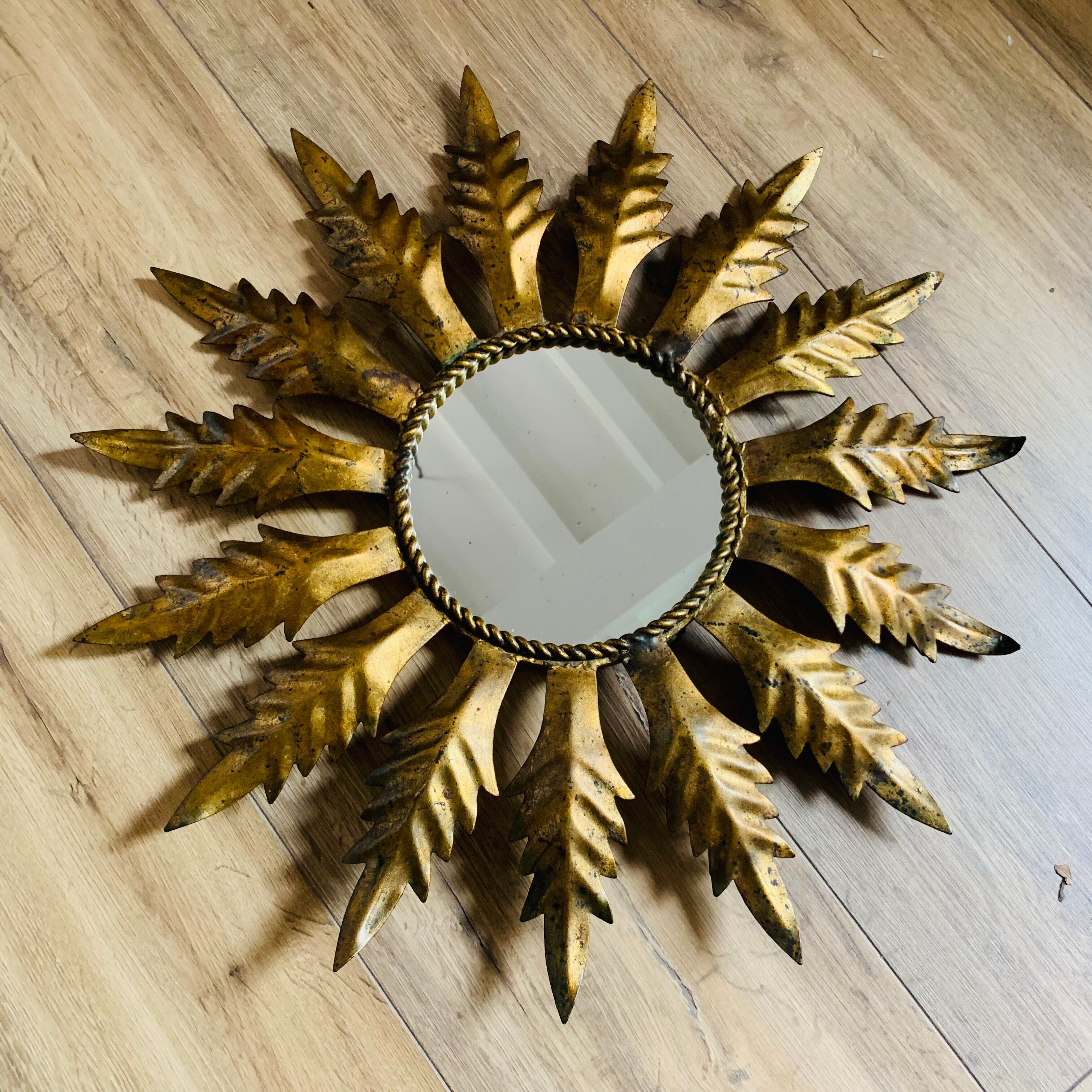 Golden metal sun mirror