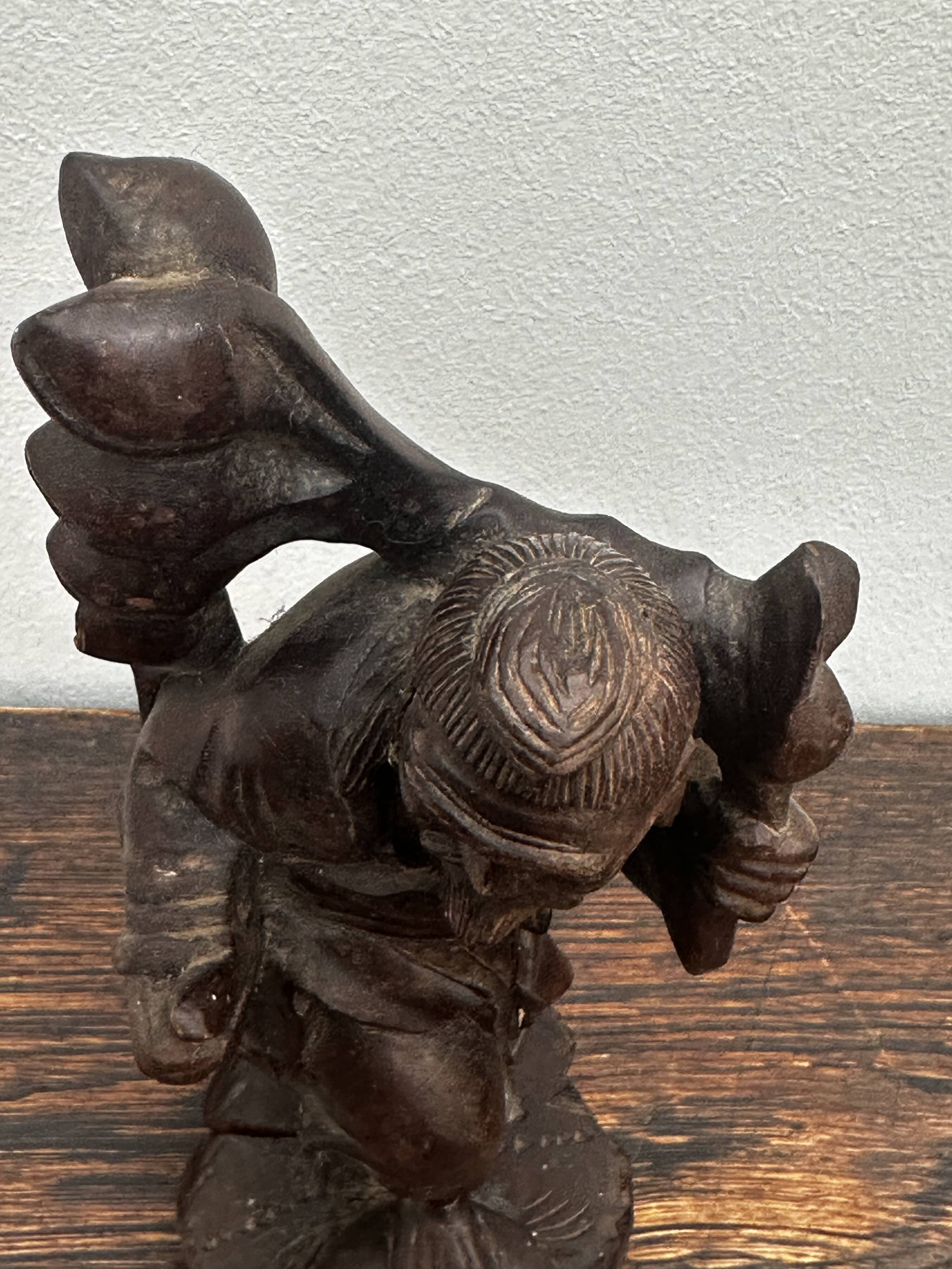 Carved wooden sculpture "Chinese peasant", early 20th century.