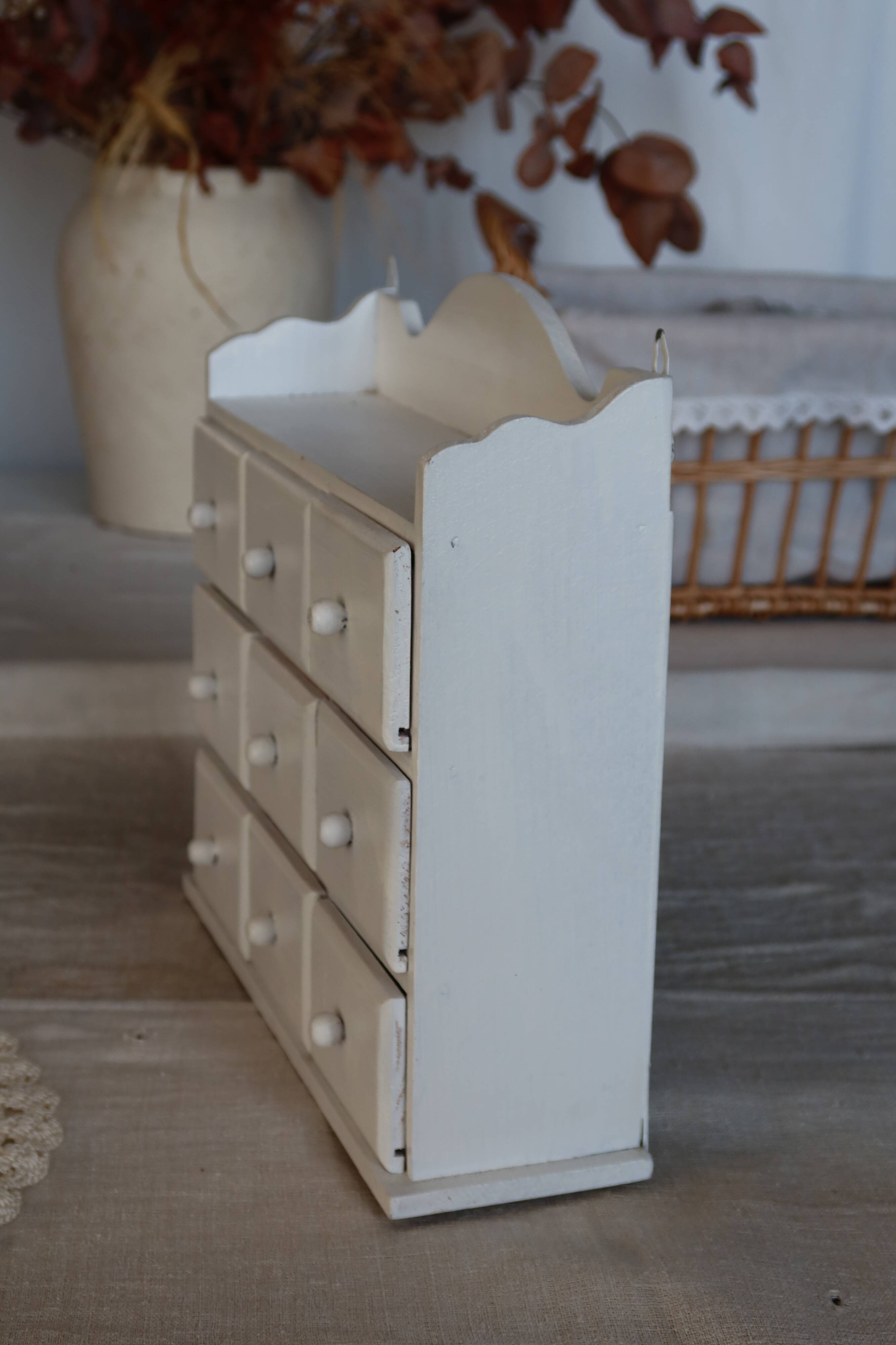 Vintage wall shelf in white wood (pine) with 9 drawers