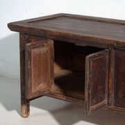 Chinese low altar cabinet with two doors and dark patina – China, around 1900