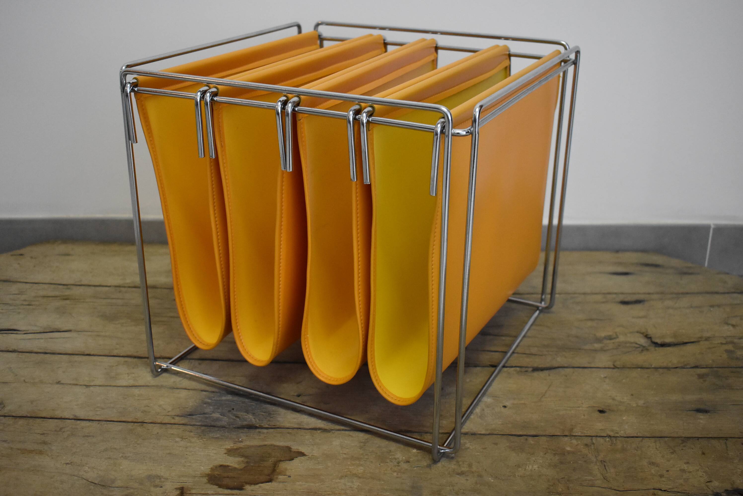 70s Orange magazine holder by Max Sauzé