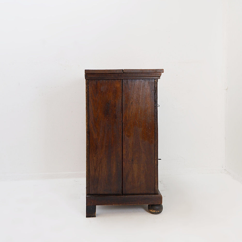 Small rustic buffet in solid wood - 2 doors and ball feet.