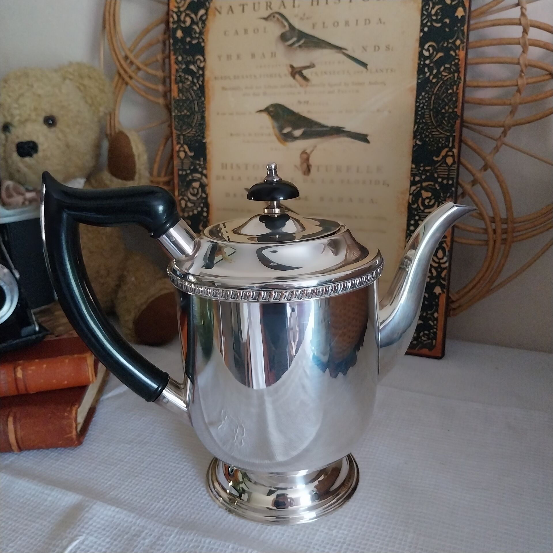 Old English coffee pot in silver-plated metal and Bakelite.