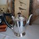 Old English coffee pot in silver-plated metal and Bakelite.