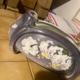 Northern hamage planter in purple color, gold edging and decorated with stenciled white lily flowers.