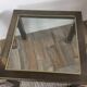 Table basse vintage en laiton et verre biseauté
