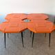 Set of 4 orange fibreglass tables from the 70s space age.
