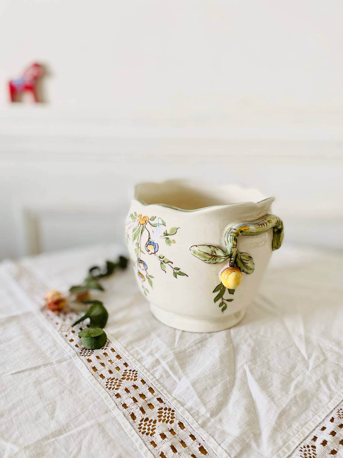 Old earthenware pot cover from Moustiers, hand decorated
