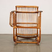 Vintage wicker armchair with magazine rack, Italy, 1960s