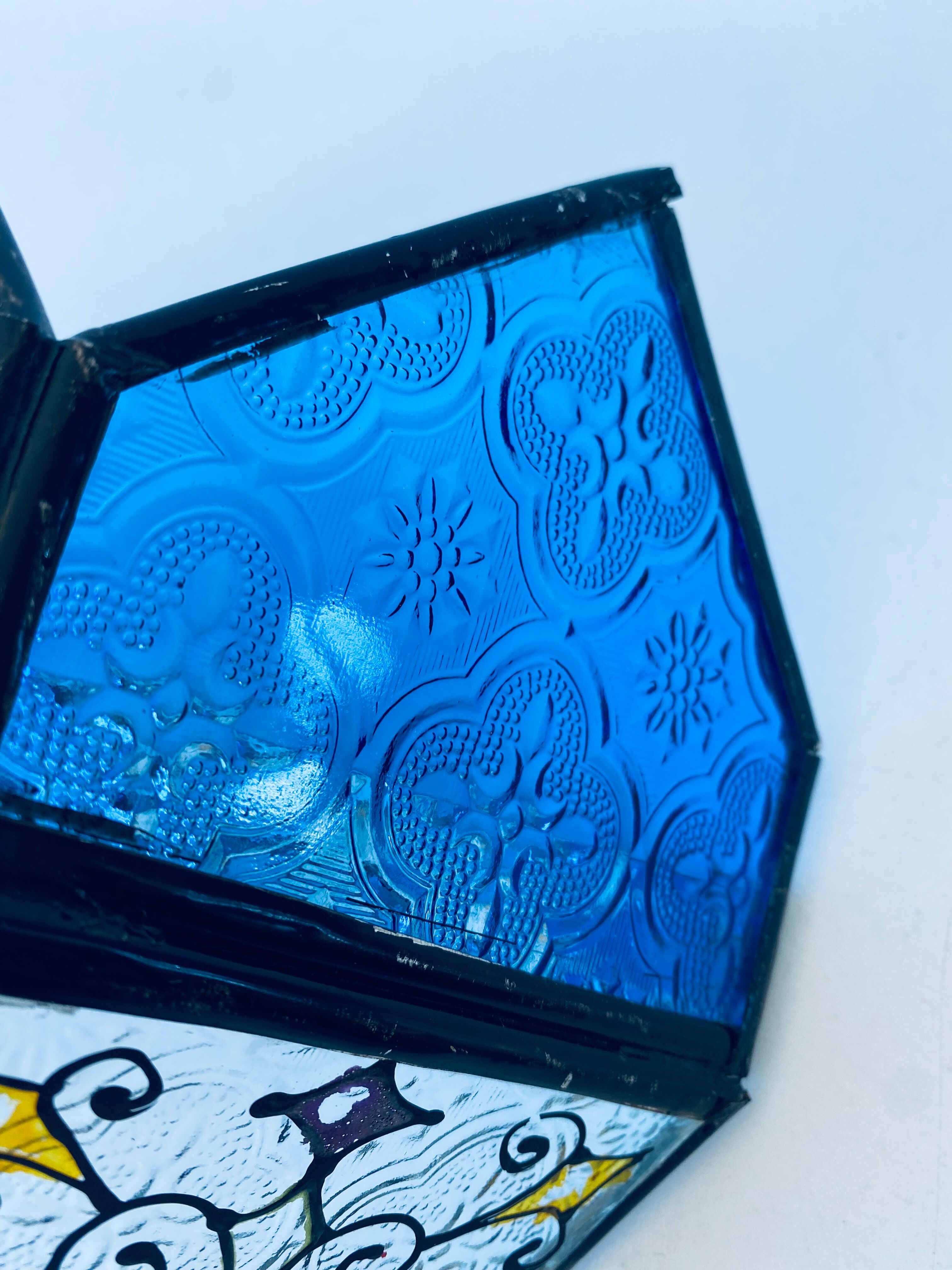 Wall lantern with stained glass windows