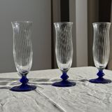 Set of 6 blue-footed champagne flutes; 3 pairs of designs.