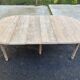Renovated Louis Philippe round extendable dining table with 4 leaves.