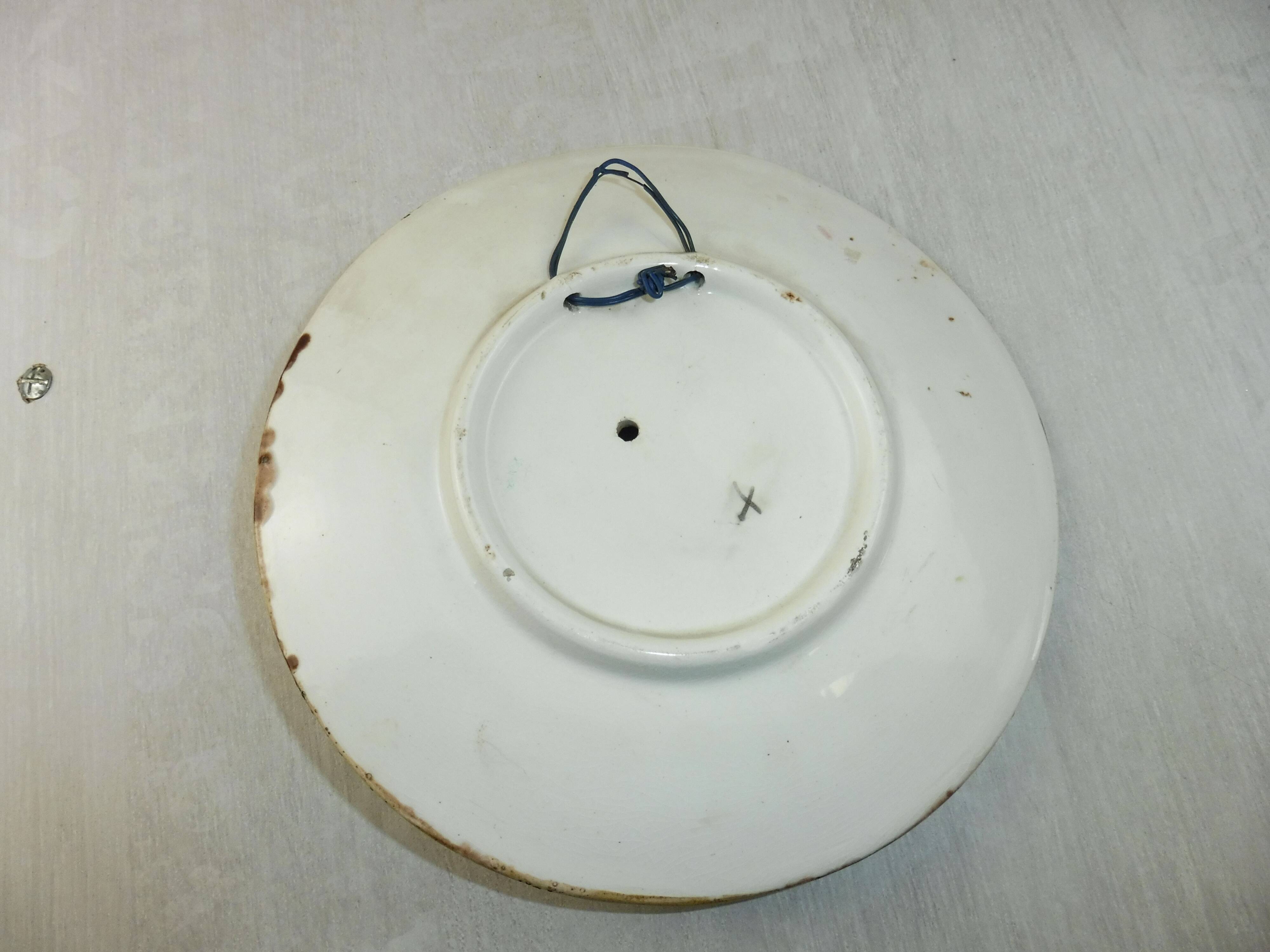 Old plate in dabbling, pear in relief