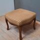 Pouf upholstered legs cambered in mahogany