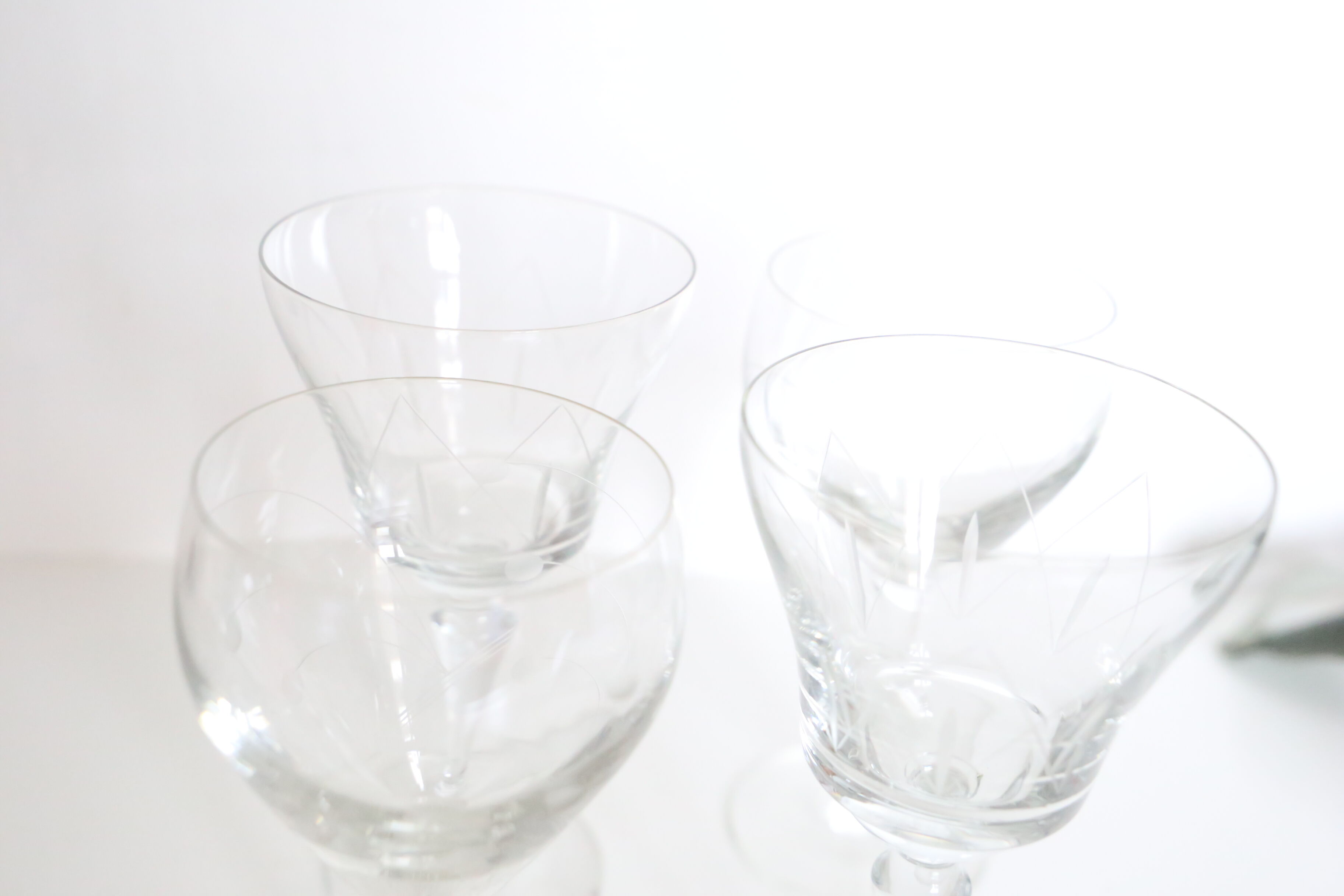 Set of 4 mismatched, crystal wine glasses