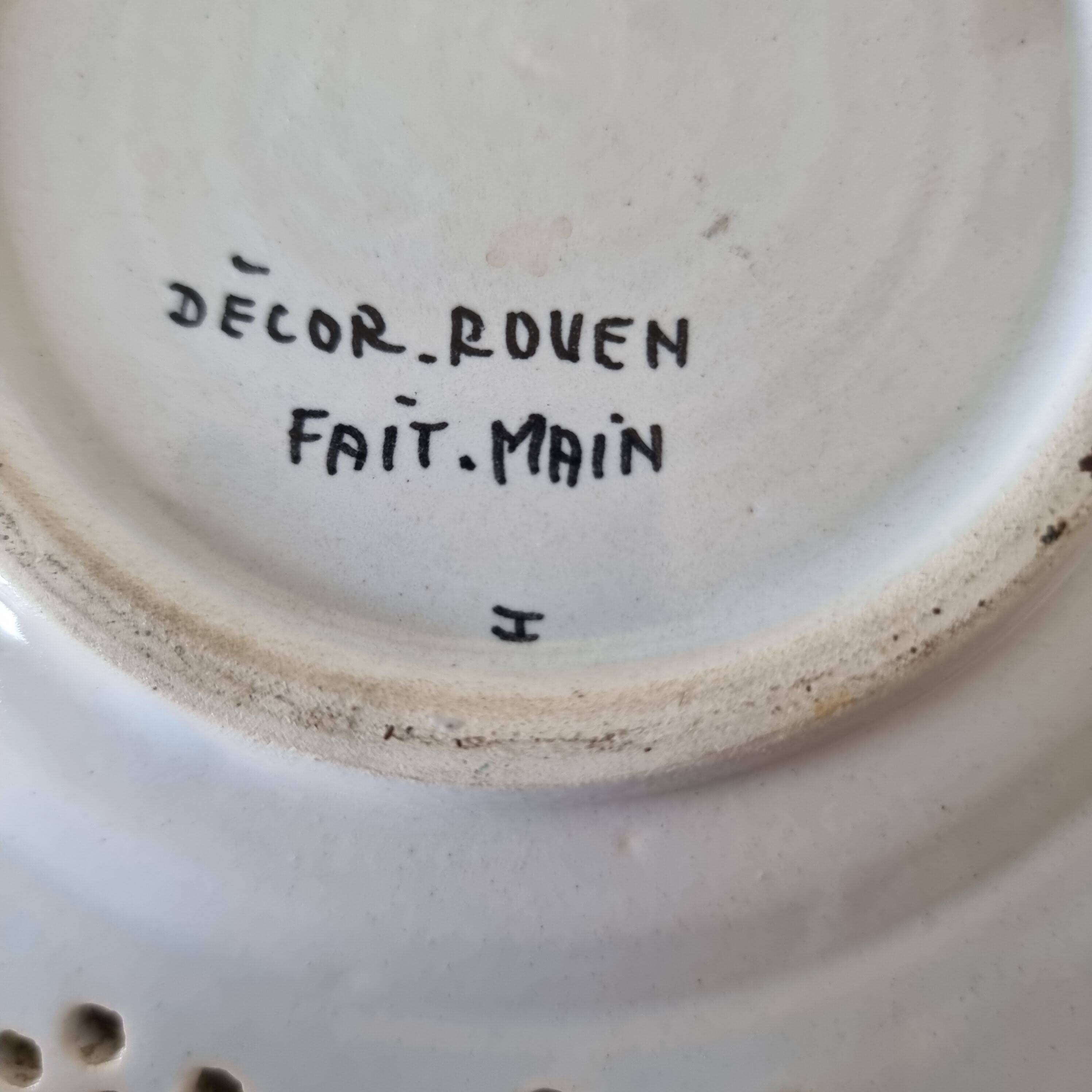 Decorative plate in Rouen earthenware, 19th century