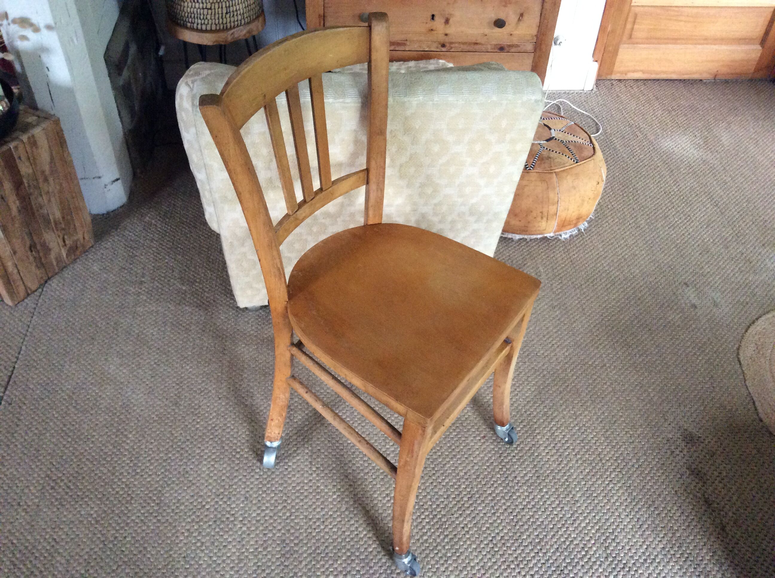 Wooden chair with wheels