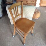 Wooden chair with wheels