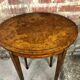 Louis XVI-style oval healing in elm magnifying glass veneer and bronze ornament