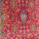Old carpet in red wool