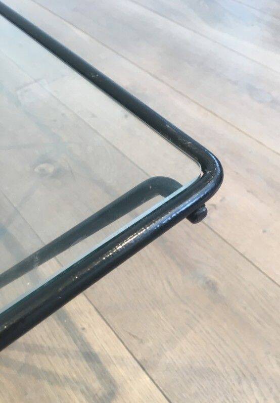 Black lacquered metal coffee table with a clear glass top. Attributed to Paolo Piva.