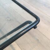 Black lacquered metal coffee table with a clear glass top. Attributed to Paolo Piva.