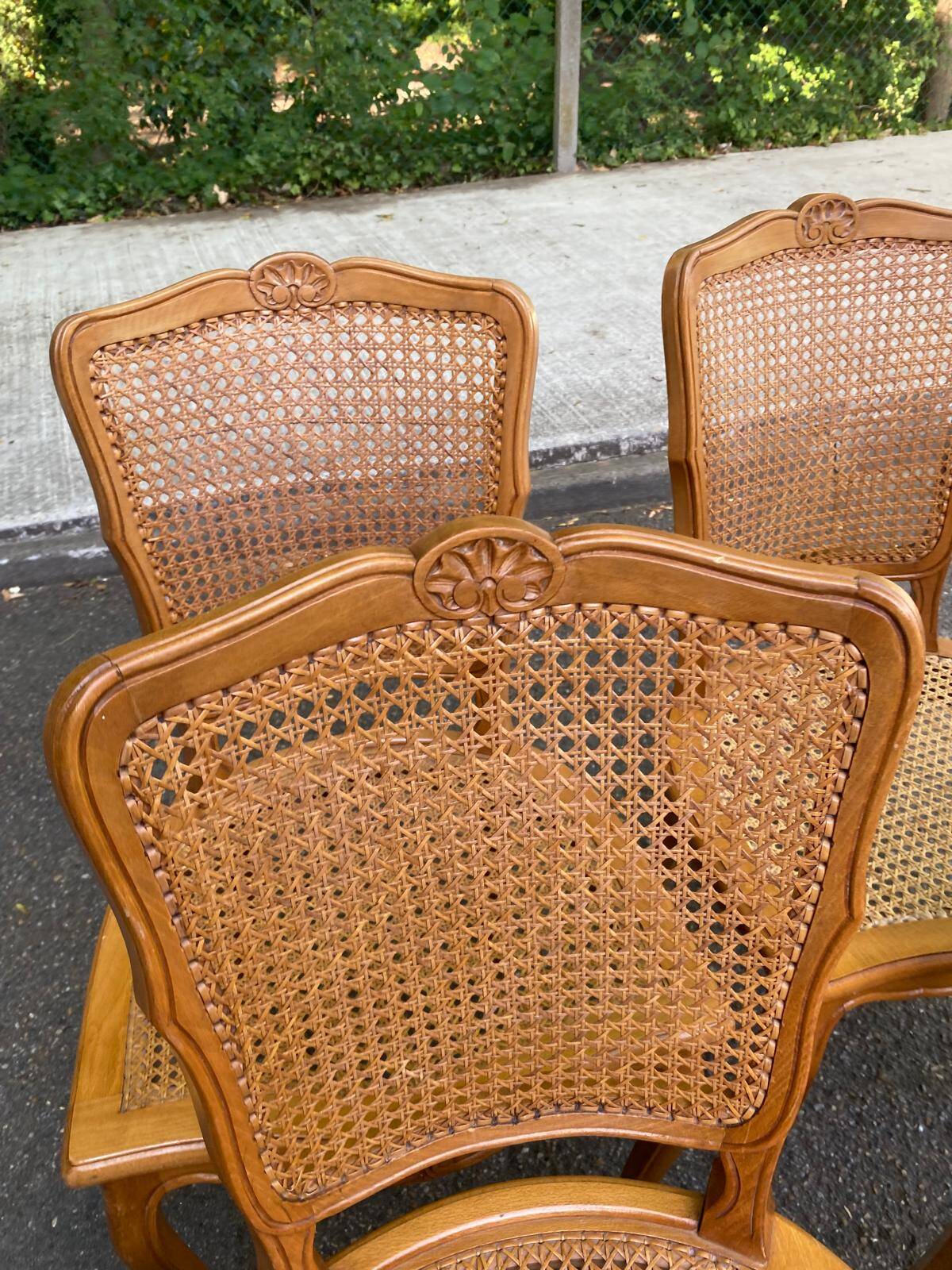 4 Louis XV dining chairs in light solid wood with caning.