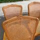 4 Louis XV dining chairs in light solid wood with caning.