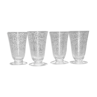 Quatre flutes Baccarat en cristal gravé modèle Michel-Ange