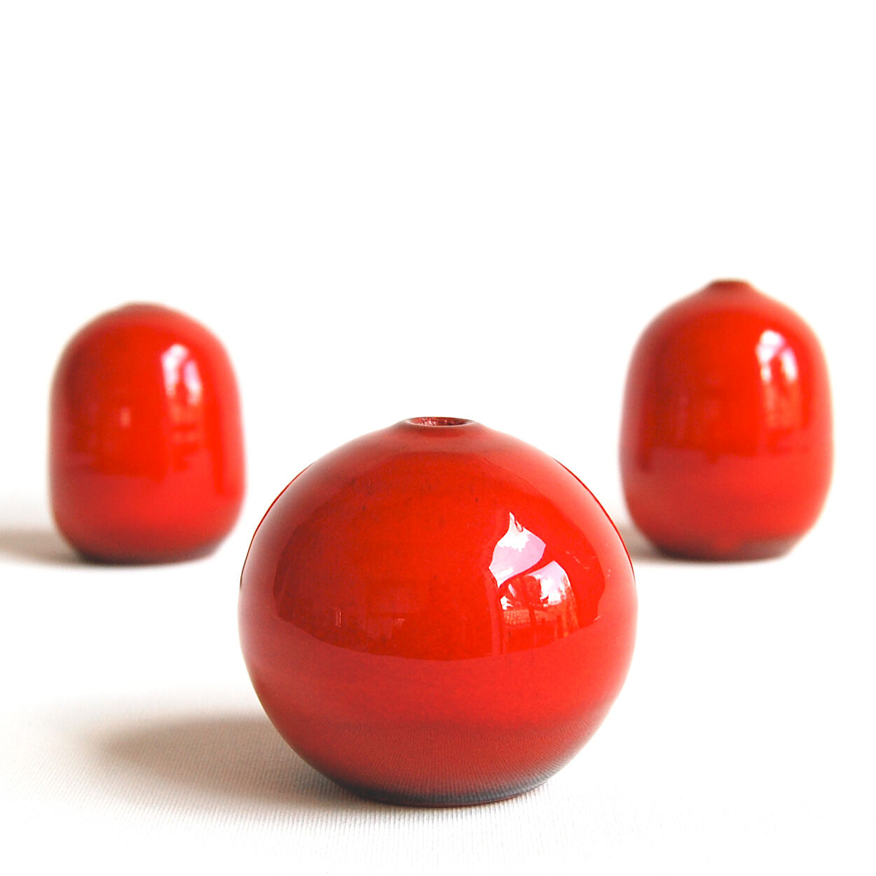 Trio of red ceramics Antonio Lampecco