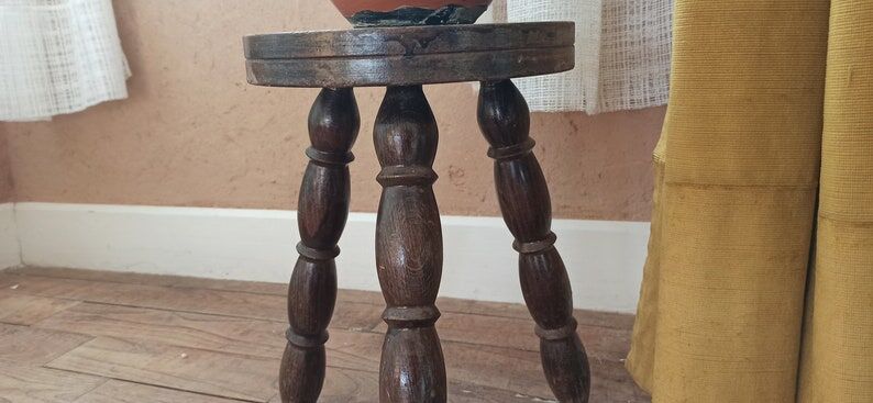 Wooden tripod stool