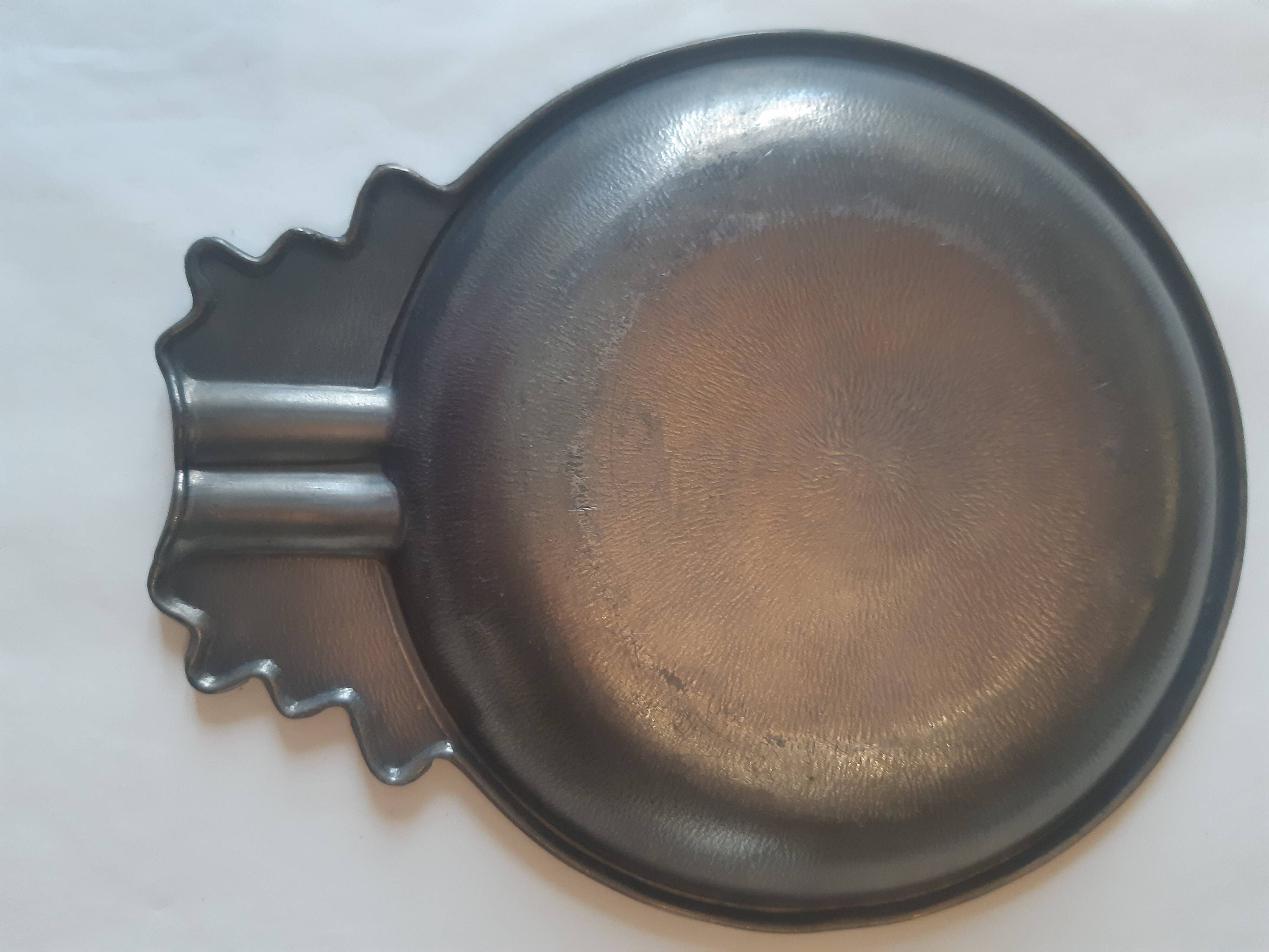 Decorated pewter ashtray
