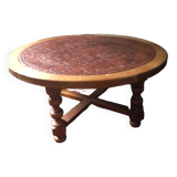 Round table in stone and wood