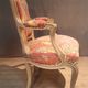 Louis XV style armchair upholstered with an Egyptian pattern.
