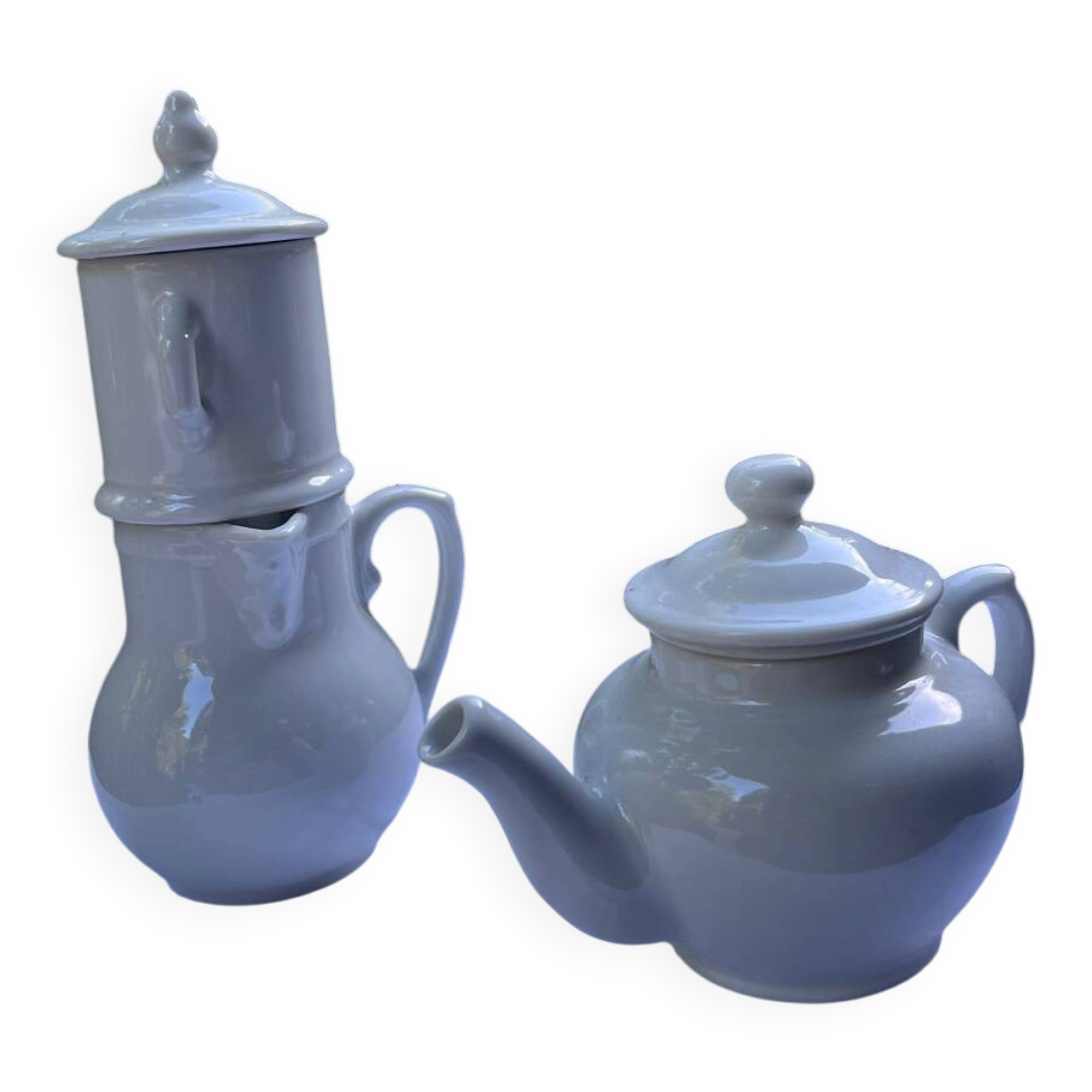 Antique white earthenware teapot, individual service with filter.