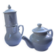 Antique white earthenware teapot, individual service with filter.