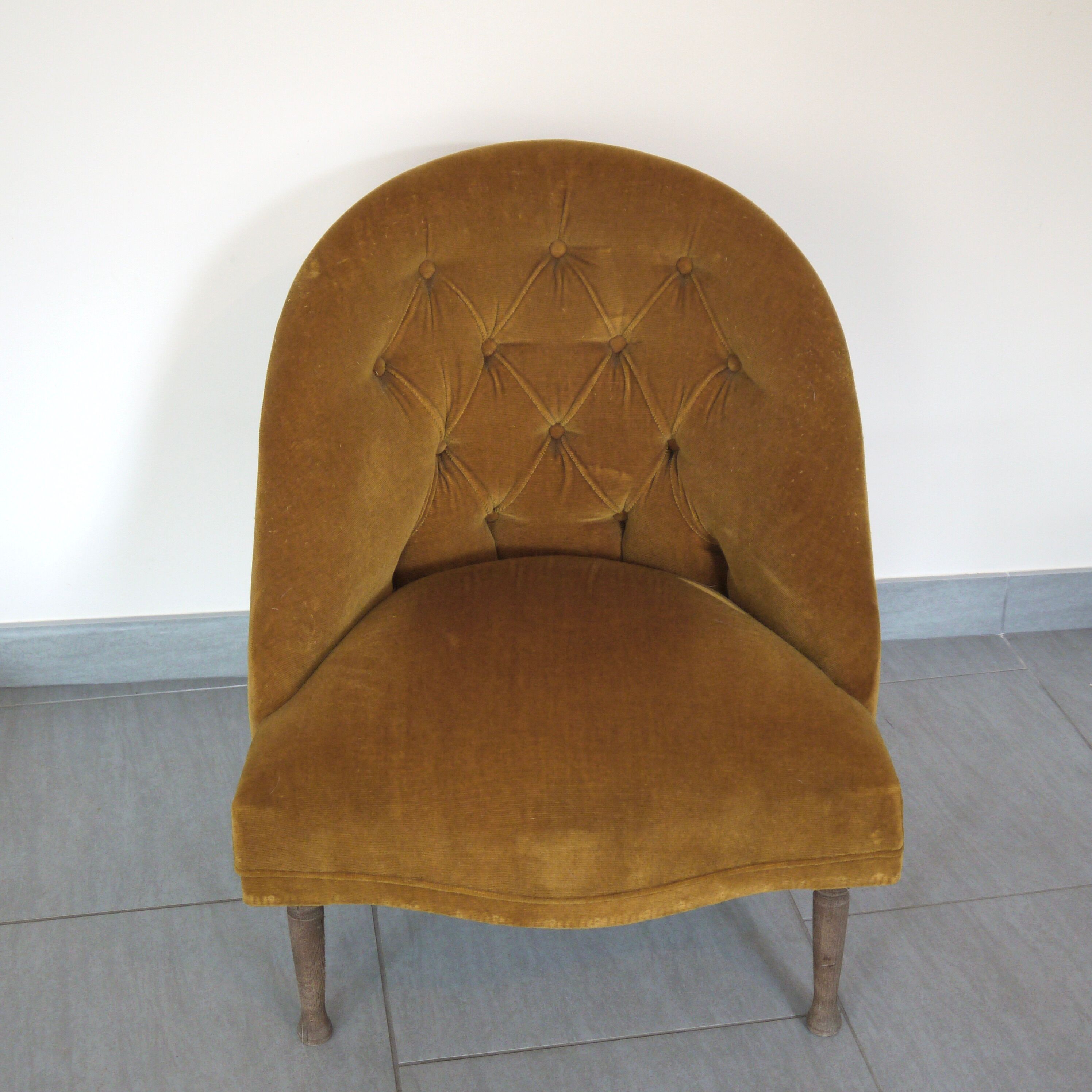 Yellow velvet padded toad armchair