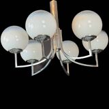 Six arms chandelier in murano glass spheres and chrome. Italy 1960s