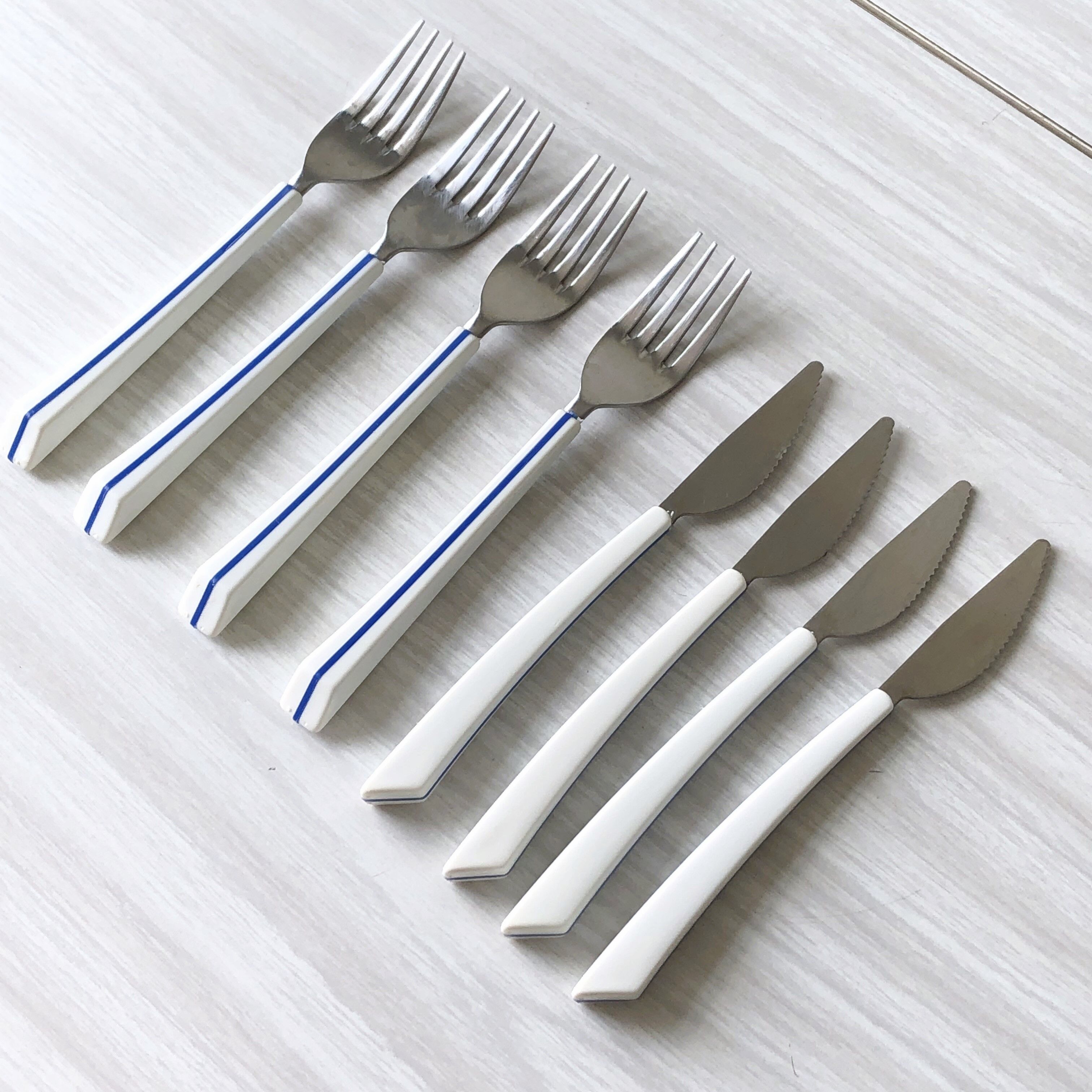Set of 4 forks and 4 knives Air France of the 70s by Nathalie George