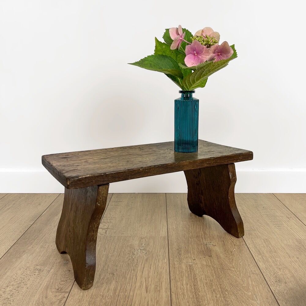Small bench or old footrest