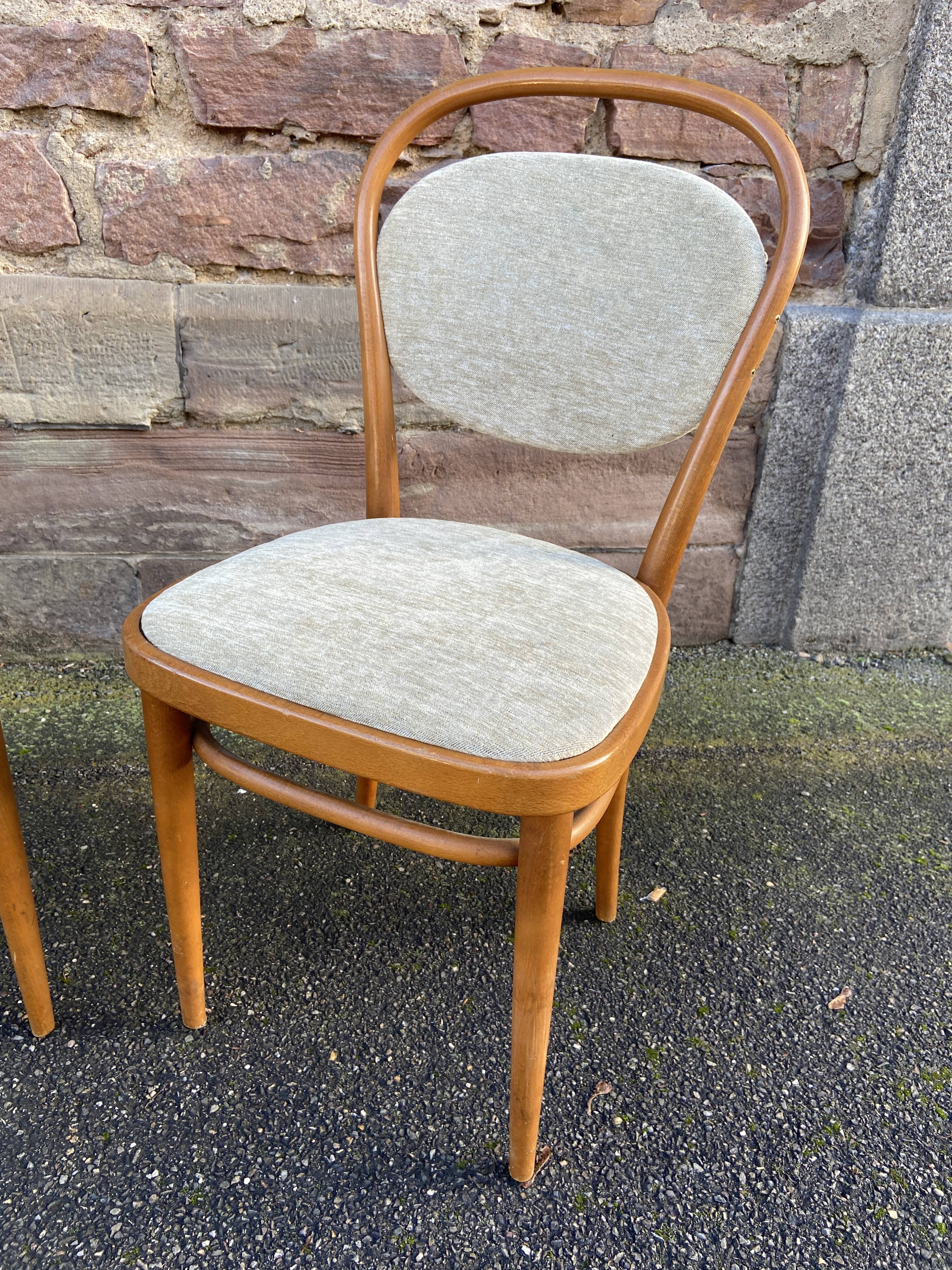 Pair of vintage curved wooden chairs